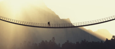 person on a bridge 375x160 1 1