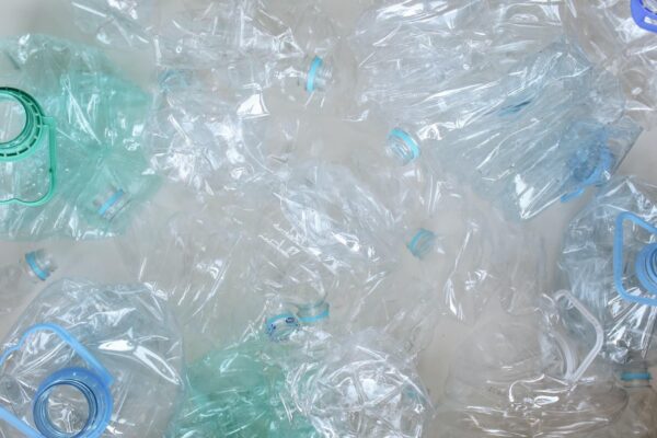 pile of clear plastic bottles