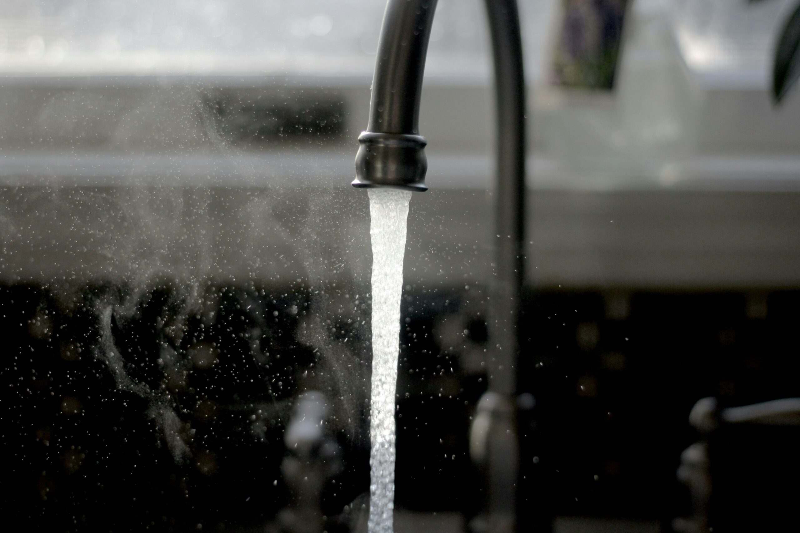 sink faucet water scaled